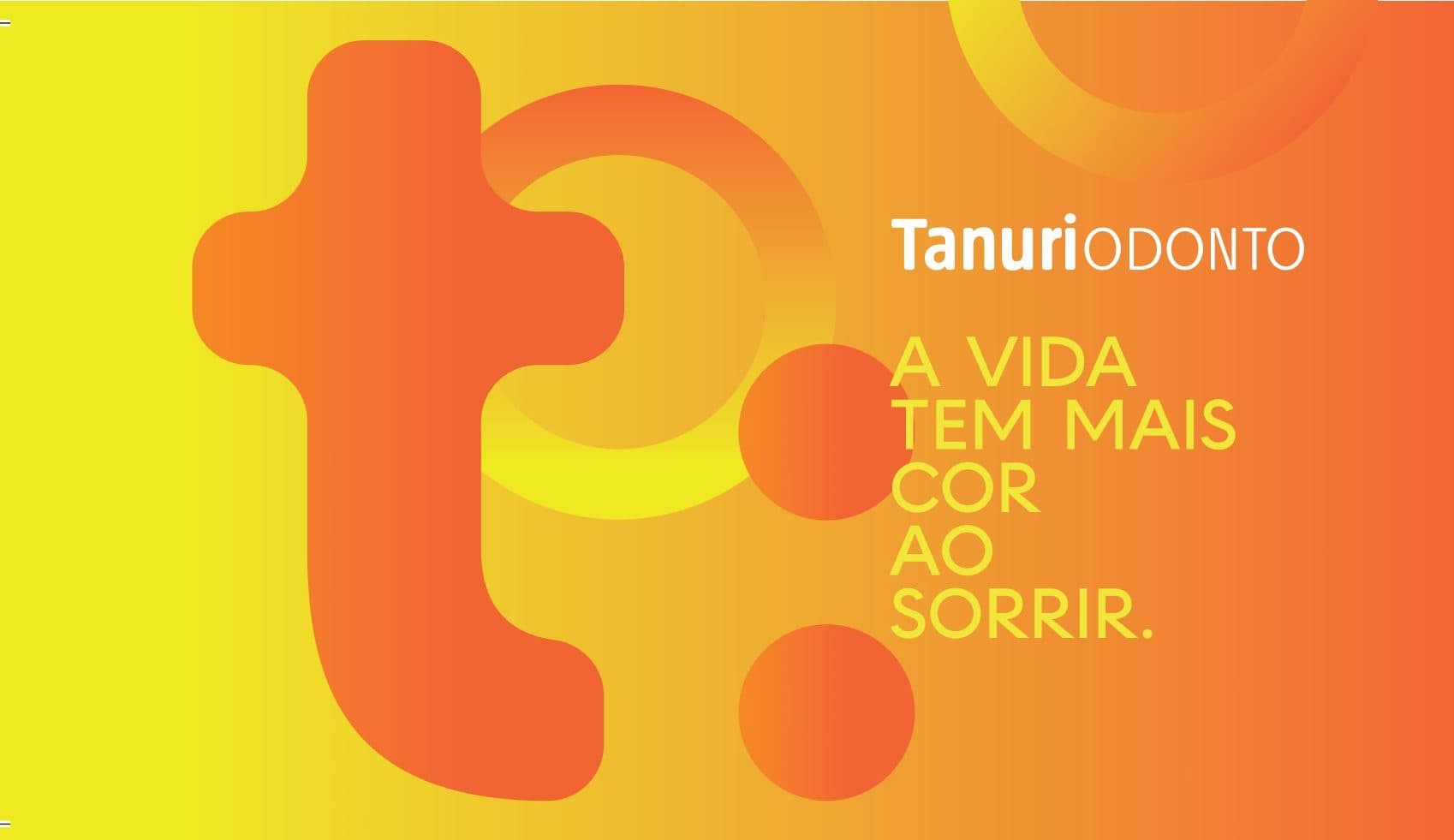 Cartão de visita da Tanuri Odonto em variação de cor amarela com formas circulares