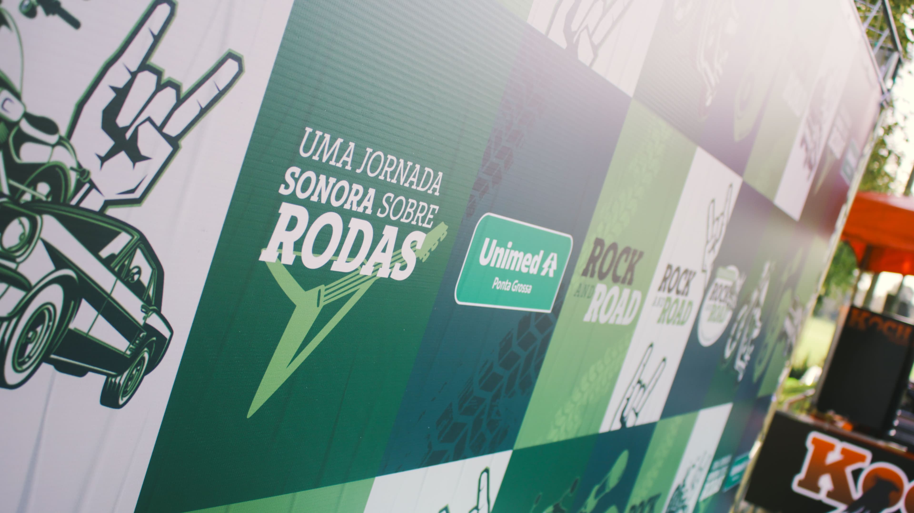 Painel de identidade visual do Rock and Road 2025 da Unimed Ponta Grossa
